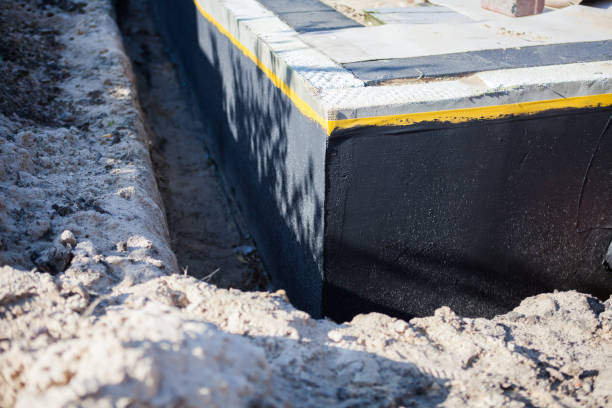 Professional Emergency Waterproofing technician working in Long Beach, IN